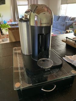 Nespresso machine  plus pod holder