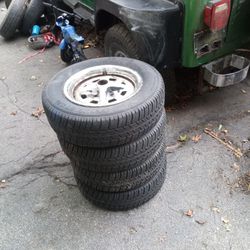 4  New Trailer Tires 14 Inch On Rims. 