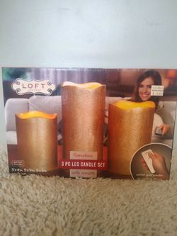 2 boxes w/ 3 flameless candle sets