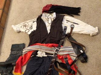 Halloween Costumes    Pirate Carribean   , KISS , Clown , SCREAM , Winnie Pooh