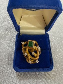 Vintage gold cocktail ring with diamonds and emerald