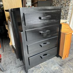 Black solid wood 4/ drawer tall boy dresser.  18 1/2 deep x 35L x 47H .