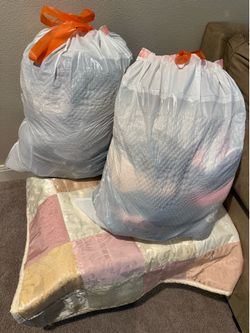 Mystery bags of women’s and a few men’s clothing