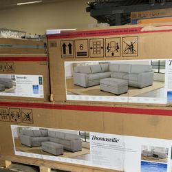 Langdon Fabric Sectional With Chaise And Storage Ottoman