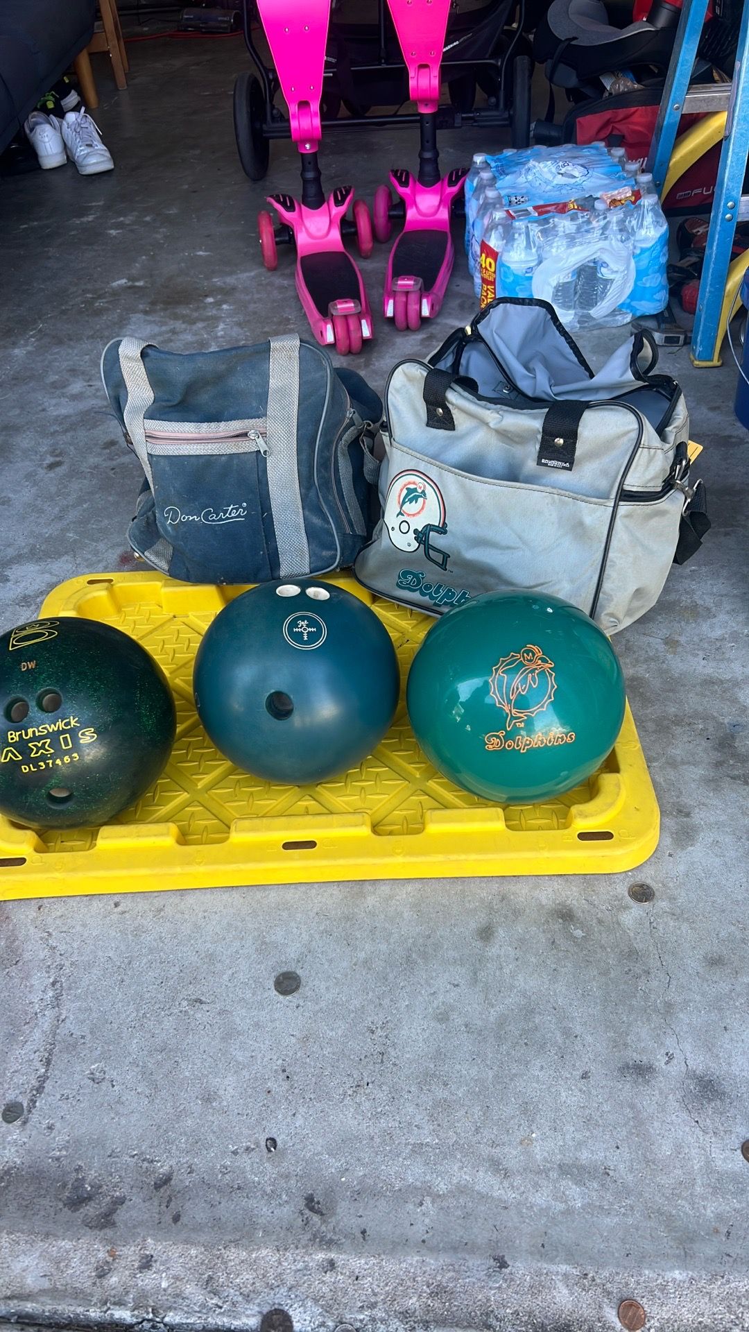 bowling balls with vintage bags.