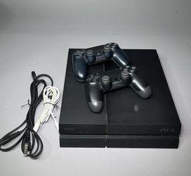 Sony PlayStation 4 500GB Black Console with Two Original Controllers