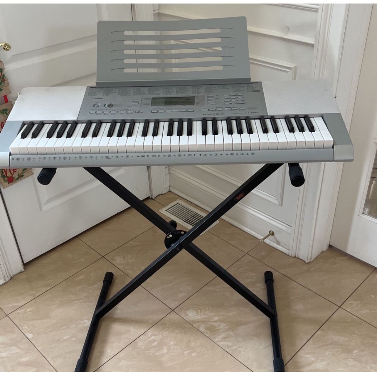 Casio LK 280 Easy Learning Light up Keyboard With Stand