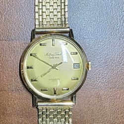 18K Gold Vintage Watch, 14K Gold Ring, Sterling Silver Earrings, and Pewter Earrings.