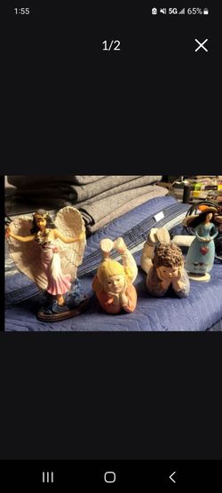 Ceramic dolls, new condition.