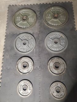 Olympic Weight Set Includes  2x45lb 2x35lb 2x25lb and 2x10lbs Thats 230lbs All Together..