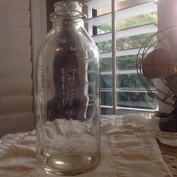 1968 Carnation Milk bottle