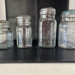 Four Vintage Canning Jars with metal clasps