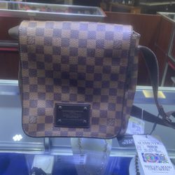 Authentic Louis Vuitton Messenger Bag!! National Pawn Battleground Ave.