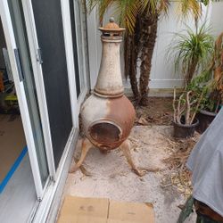 Cast iron wood burning stove for outside