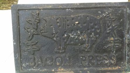 Cast iron bacon press