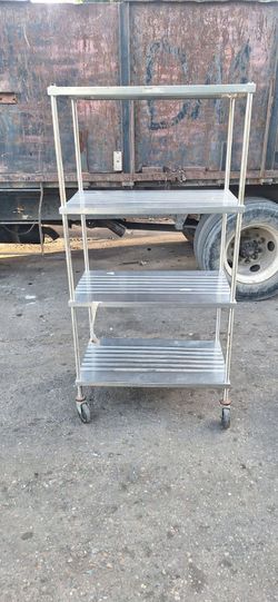 Commercial stainless steel storage rack on wheels.