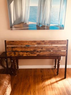 Rustic looking wood and metal queen size bed headboard