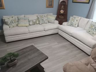 Like new couch and loveseat with pillows cash only in excellent condition
