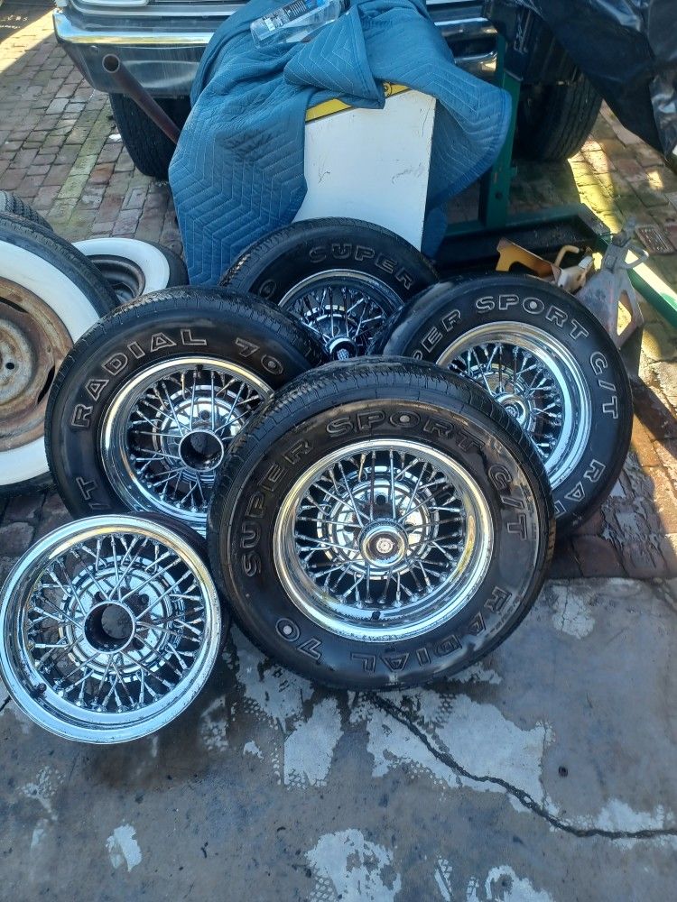 14x7 TRU SPOKE WIRE WHEELS!! 4 LUG!! 875$