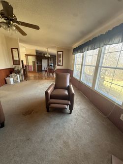 2 recliner brown chairs