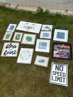 Lots of picture frames and miscellaneous