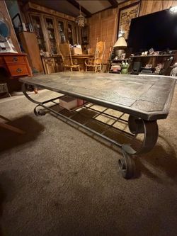 6 piece stone table and wrought iron living room table set with lamps.