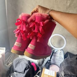 Pink ugg bow boots size 6