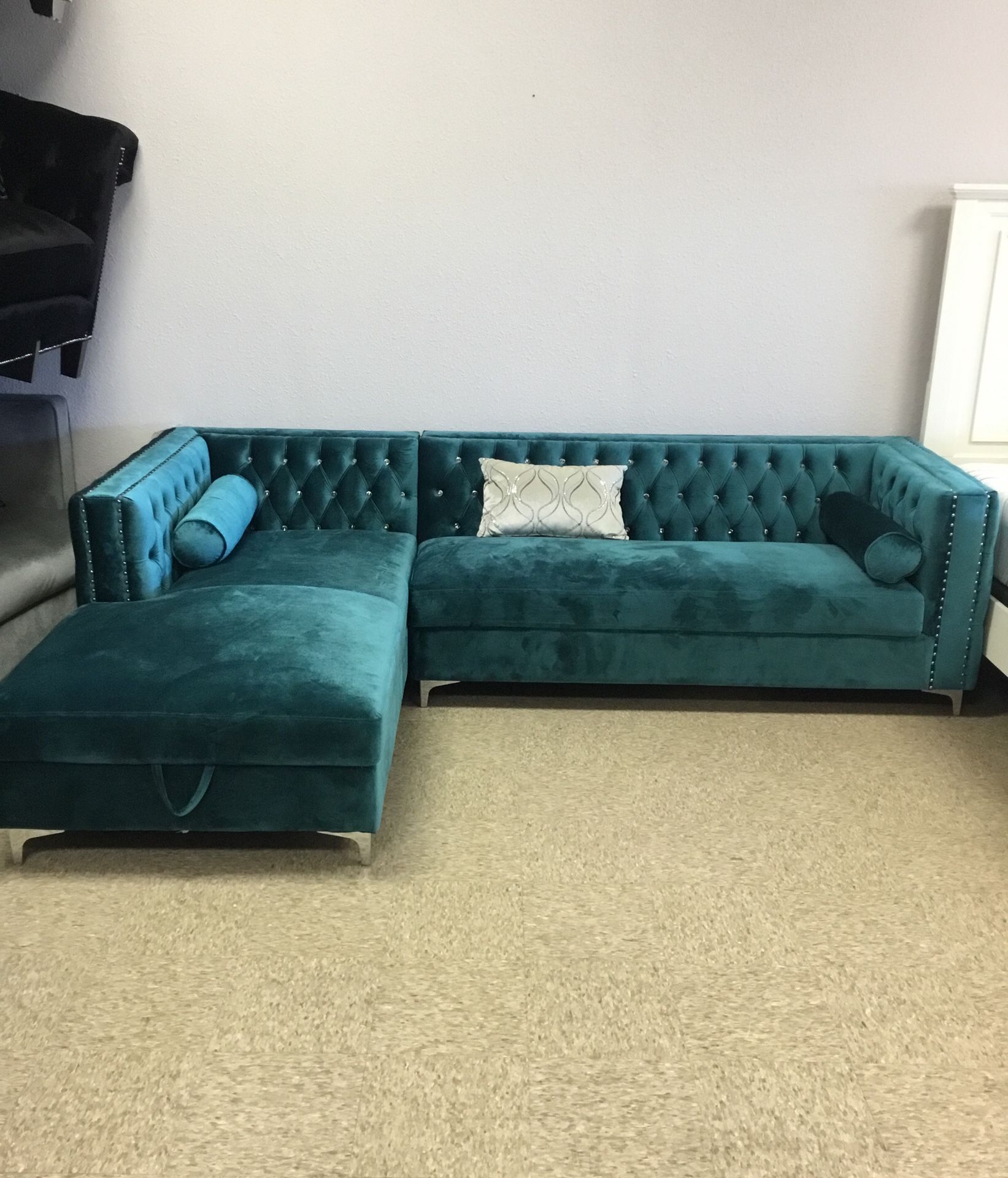 Teal rhinestone tufted sectional with storage chaise