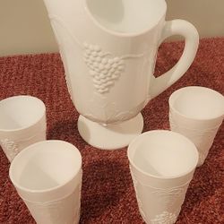 Vintage milk glass set, which includes the pitcher and four tumblers 