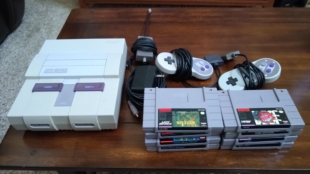 Super Nintendo w/ 8 Games