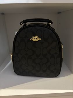 Coach black backpack or crossbody