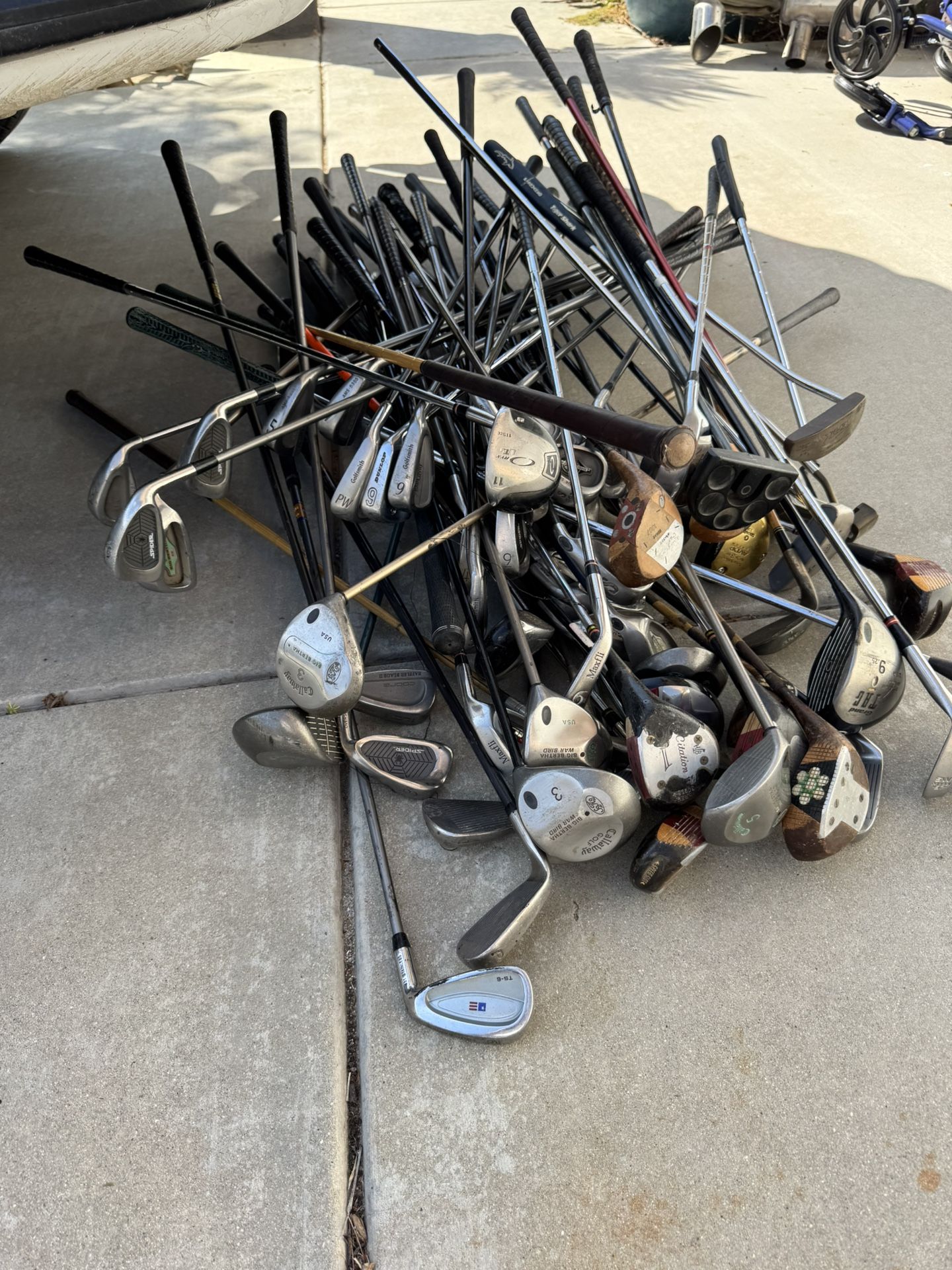 Lot Of Golf Clubs