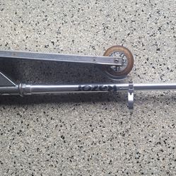 Black handle Razor  Scooter - 2 wheeled in good condition.
