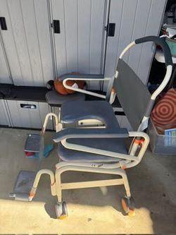 Barely used, XL roll-in showerbuddy chair