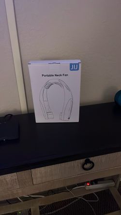 PORTABLE NECK FAN :opened But Never Used And Comes With Everything 20$ Or Best Offer