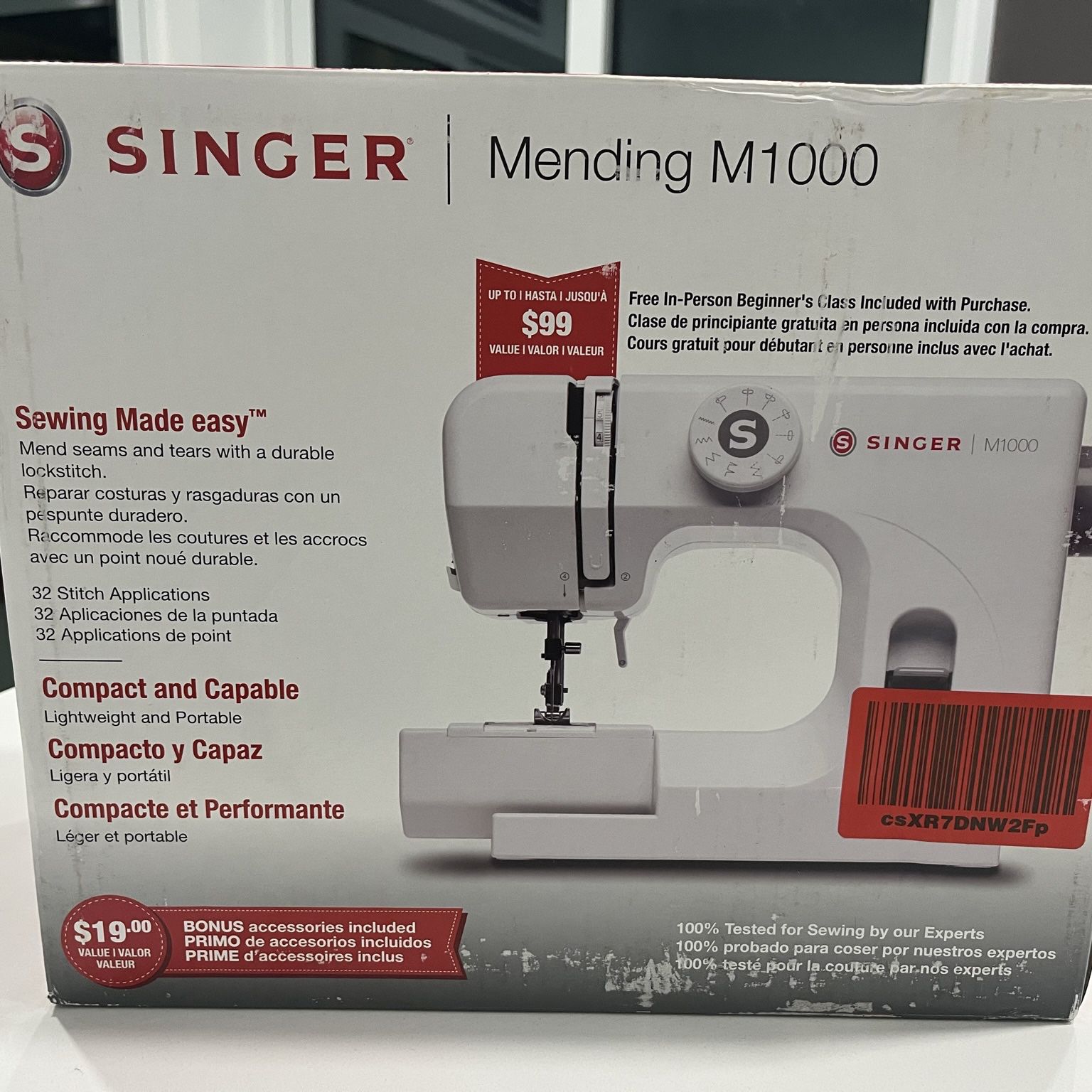 Singer M1000 Sewing Machine with 32 Stitch Applications and