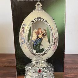 Home For The Holidays Revolving Jeweled Egg Christmas Musical Angel First Noel