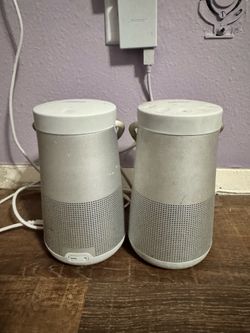 2 Bose portable speakers