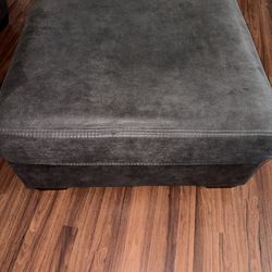 Dark Gray Ottoman – $50