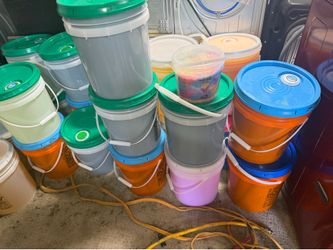 Here I have 5 Gallon BUCKETS 🪣 of detergent🧼  T and G I also have all purpose cleaners Down Fabric softners Blue and Yellow bleach and Scent beads a