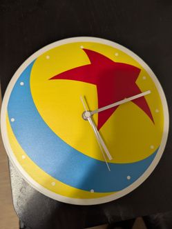 DISNEY~PIXAR LUXO BALL WALL CLOCK