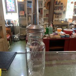 4x15 STANDARD OIL COMPANY SERVICE INDIANA BOTTLE and spout.  129.00.  Johanna at Antiques and More. Located at 316b Main Street Buda. Antiques vintage