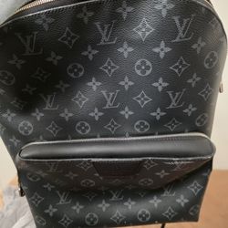 Louis Vuitton
Monogram Eclipse Discovery Backpack PM