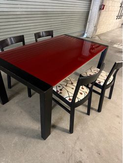 Dining glass and able with 4 chairs 62 1/2 x 35 x 30