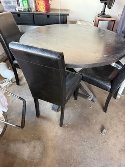 Round table with 6 chairs