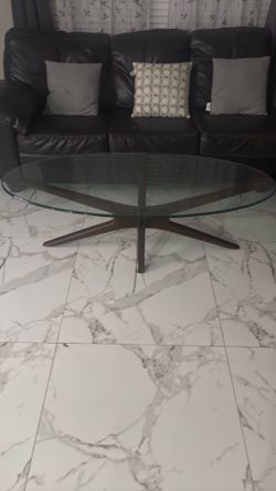 Glass oval table 60” x 28”