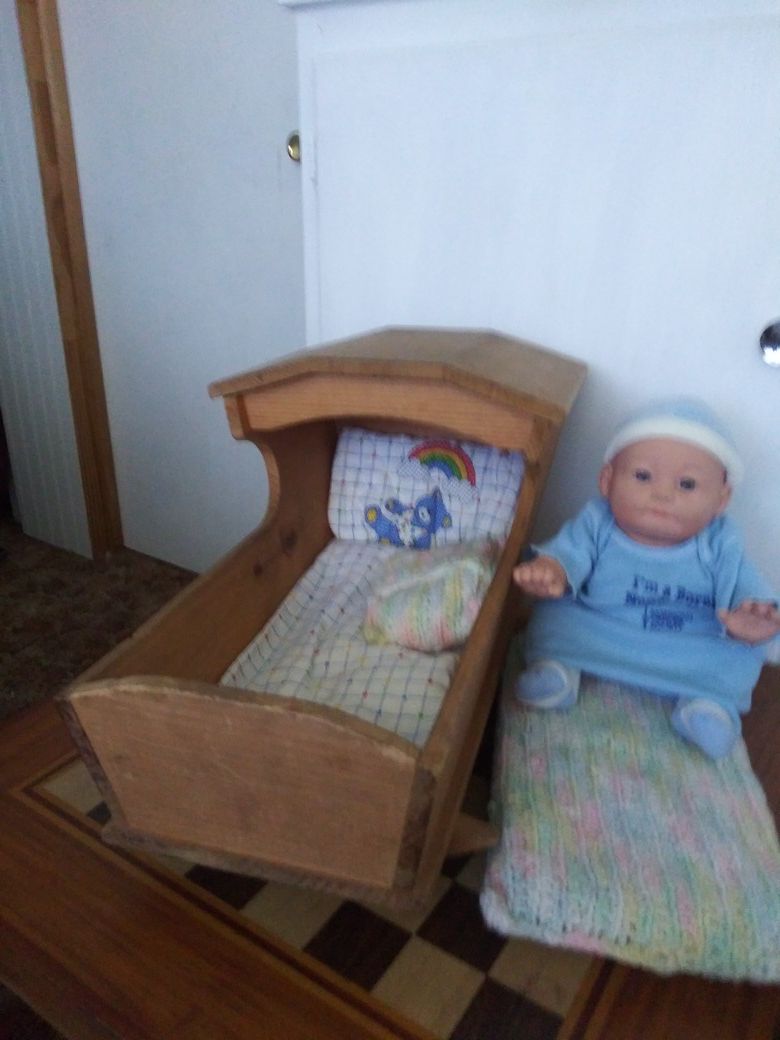 Handmade wooden doll cradle