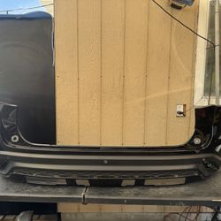 2024 2025 CHEVROLET TRAX REAR BUMPER COVER OEM USED 