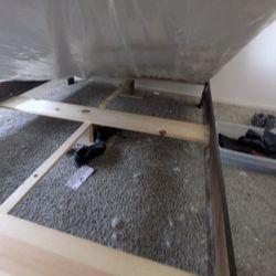 QUEEN SIZED WOODEN BED FRAME . 