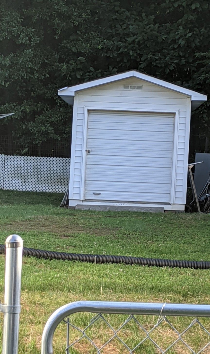 Building With Metal Roll-up Door